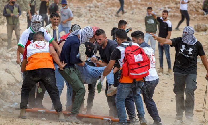 استشهاد فلسطيني وإصابة العشرات