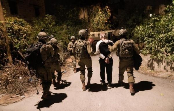 اعتقال 14 فلسطينيا في الضفة